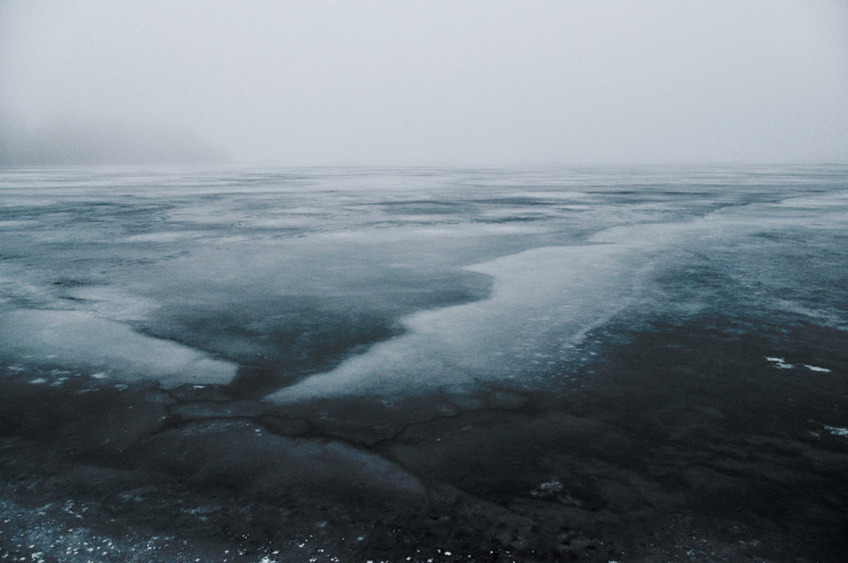 Fine art photography of frozen Danish lake in misty weather, photo by Niels-Jacob Dandanell.
